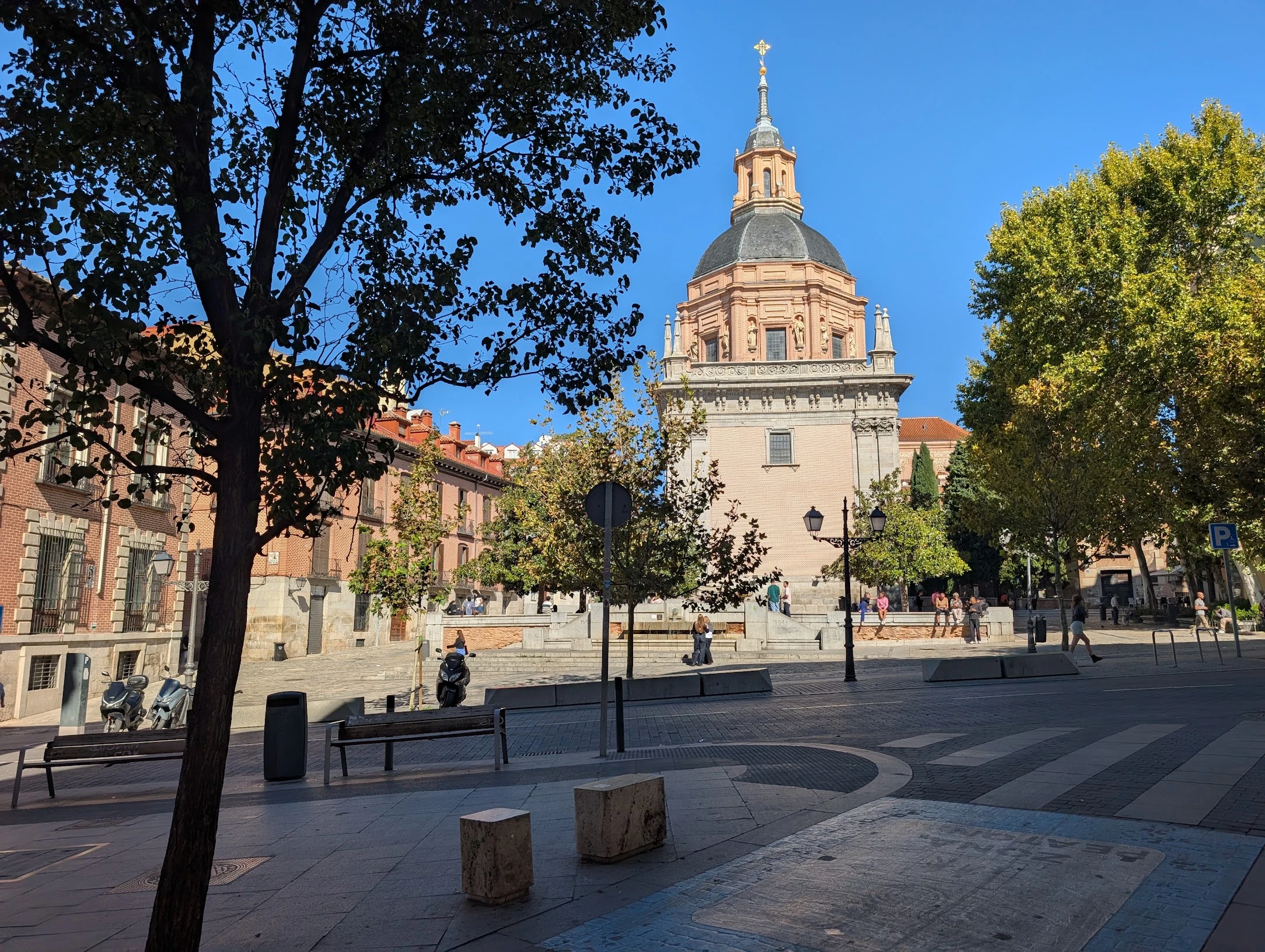 La Latina by day, among trees and historic architecture